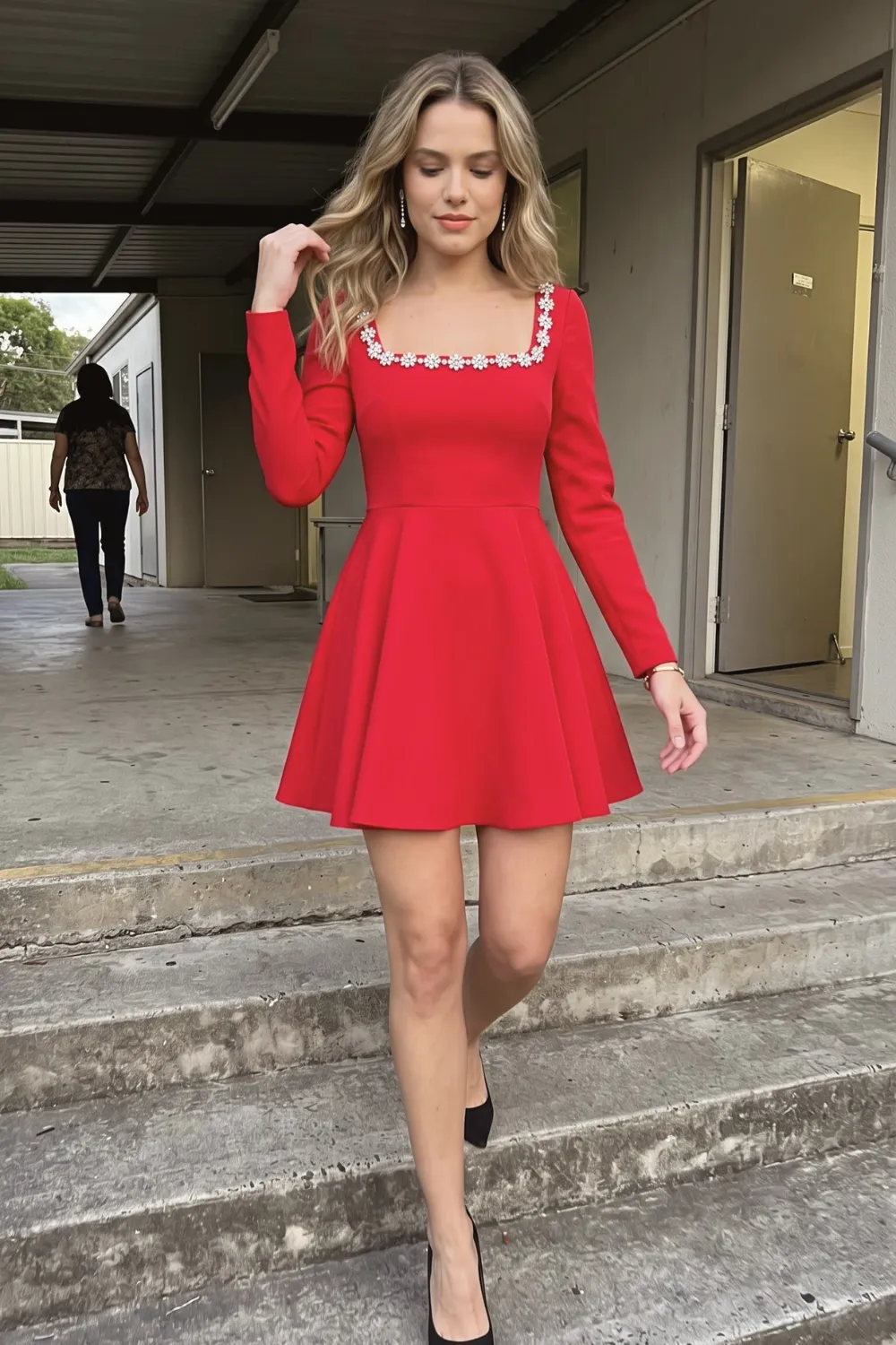Woman in red square neck floral trim skater mini dress